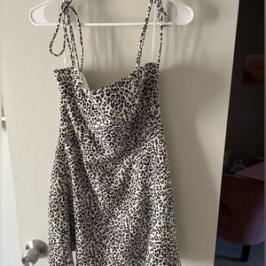 Princess Polly leopard print skater style dress with adjustable tie strapsSize 8